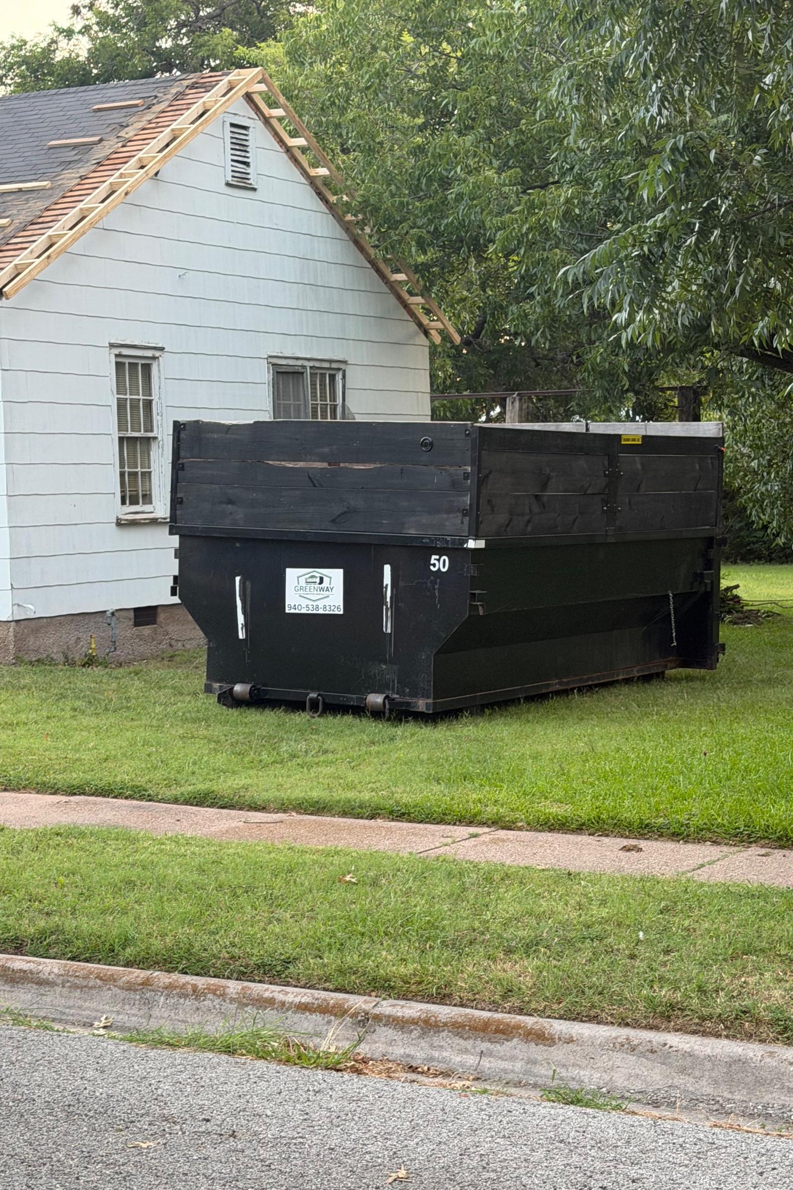 Black 25 yard dumpster available for rent | RentThis